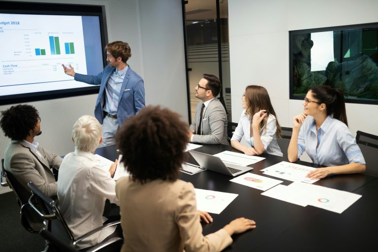 a group of people around a table